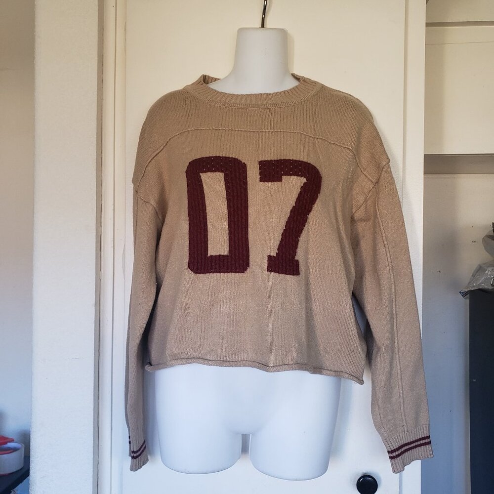 Urban Nation Sweater with the numbers 07 on it.